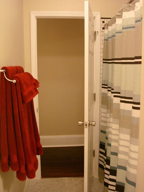 Combined shower/tub, hair dryer, towels, soap