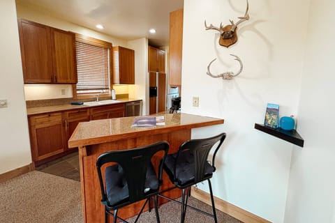 Full size kitchen with a breakfast bar