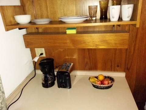 Fridge, microwave, coffee/tea maker, toaster