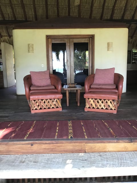 Lounge chairs facing the ocean