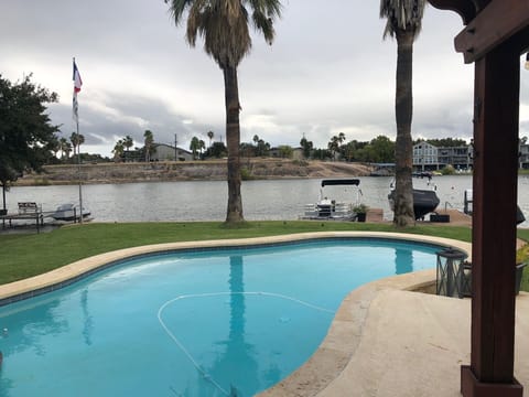 Backyard pool and boat slips