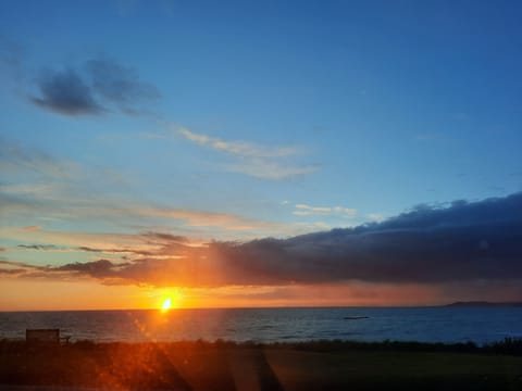 A stunning view  of the sunset from your bedroom window. 