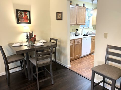 Gather around the dining area, seamlessly integrated into the main living room.