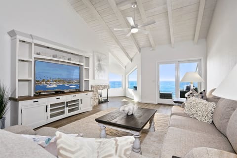 Spacious Living Room with large TV and even larger views of the Pacific Ocean!