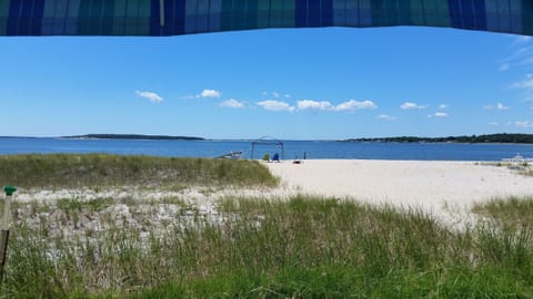 On the beach, sun loungers, beach towels