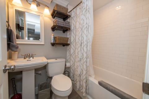 Combined shower/tub, hair dryer, towels, soap