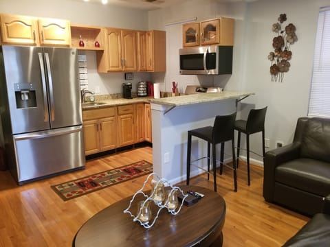 Full kitchen with breakfast bar seating