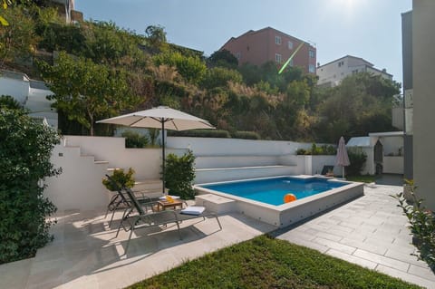 swimming pool with shower outdoor