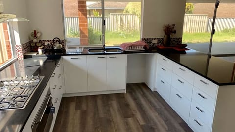 Microwave, dishwasher, dining tables