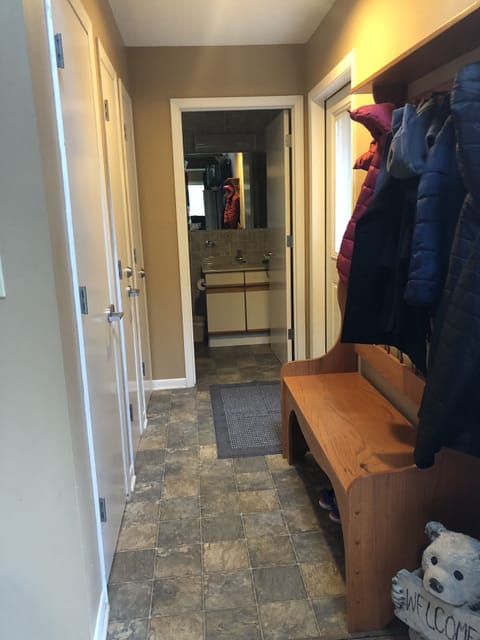 Entry way and view of additional 4 piece main floor bathroom 