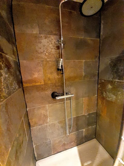 Combined shower/tub