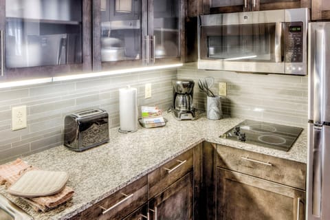 Prepare meals in the full kitchen