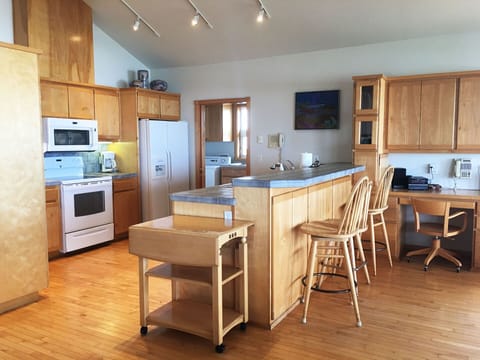 Kitchen  - additional seating at the bar.
