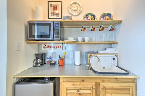 Fridge, microwave, coffee/tea maker, cookware/dishes/utensils