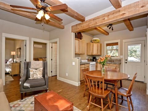 Looking from fire place toward kitchen and back door
