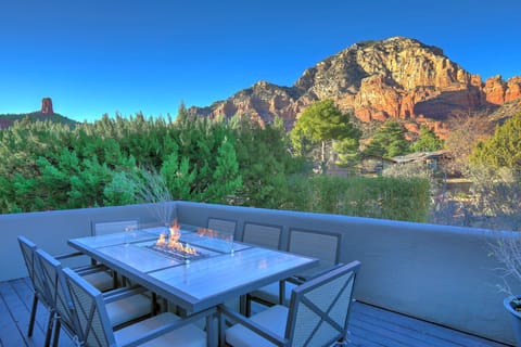 Outdoor patio with a fire dining table.