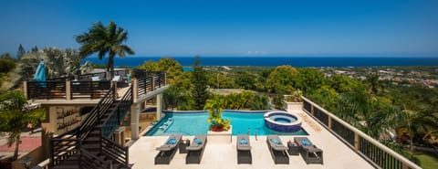 Outdoor pool, an infinity pool, sun loungers