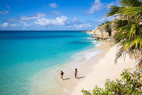 On the beach, sun loungers, beach towels