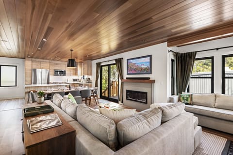 The Smart TV, electric fireplace, and inviting seating make this a perfect gathering spot.