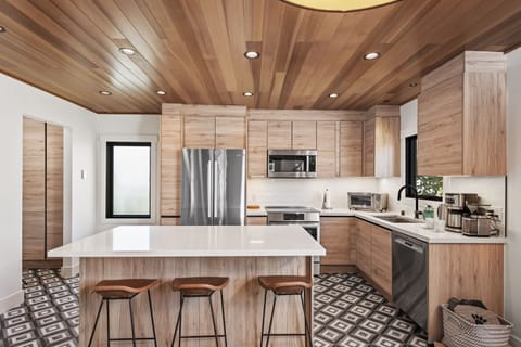 All new stainless steel appliances in the kitchen.