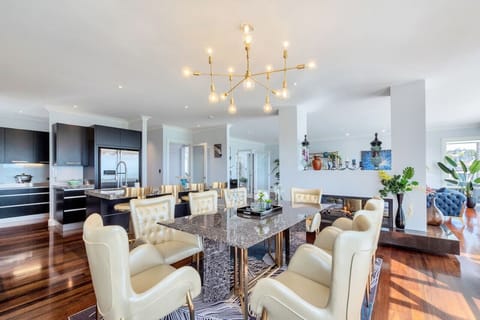 The formal dining room is a great spot to eat together whilst enjoying the fireplace. You can retire to the living room after dinner.