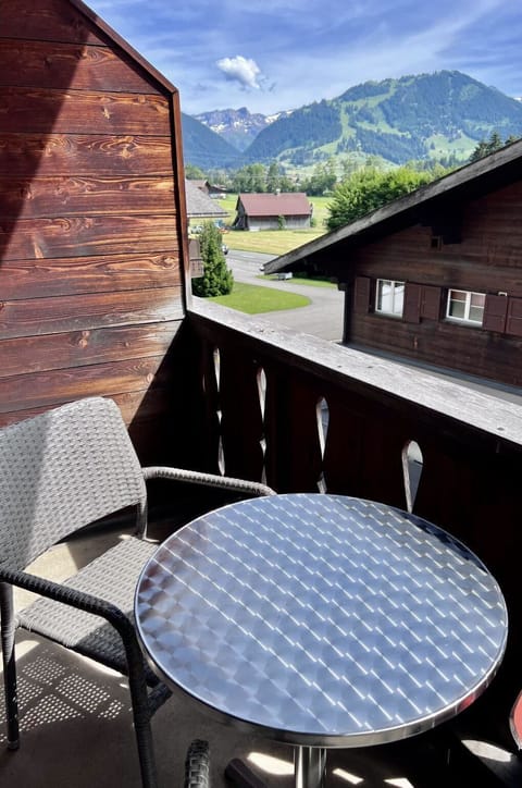 Table, Furniture, Cloud, Property, Building, Sky, Window, Chair, Outdoor Table, Wood