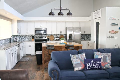 Large Kitchen. Stainless appliances. Granite counters. Big island. Lake views.