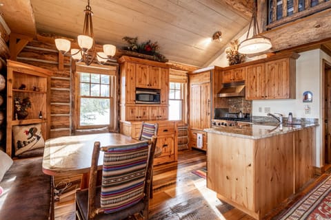 Kitchen table seats 6 and opens to kitchen, living room, beautiful mtn views