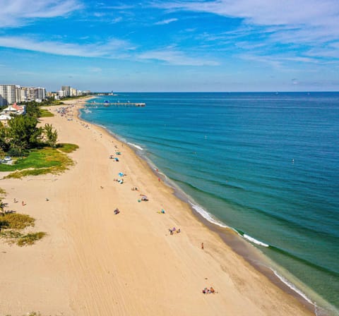 On the beach, sun loungers, beach towels