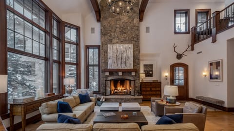 Great Room with grand fireplace vaulted ceiling