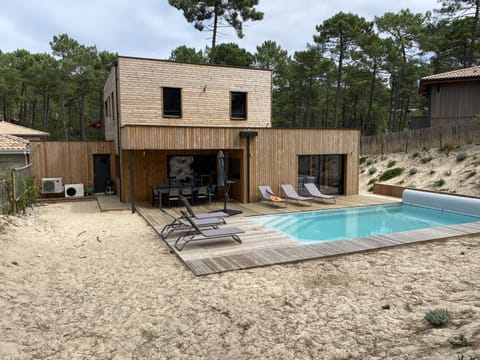 Outdoor pool, a heated pool, sun loungers