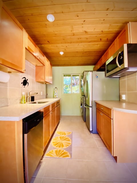 Love our little kitchen. Plenty of extras in those cupboards. 