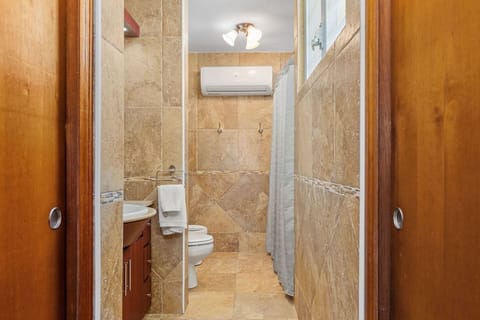 Combined shower/tub, hair dryer, towels, soap