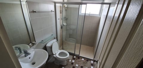 Combined shower/tub, shampoo