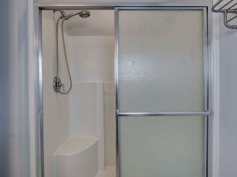 Combined shower/tub, hair dryer, towels, soap