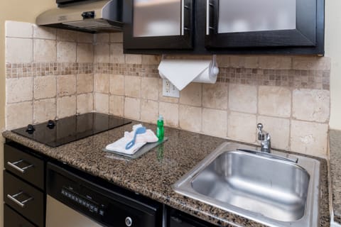 Prepare a meal in the equipped kitchen.