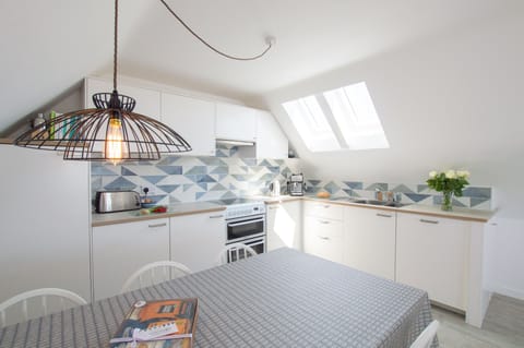 Sunfish, Porthtowan. First floor: Kitchen and dining area