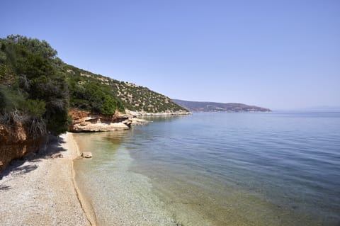 On the beach, sun loungers, beach towels