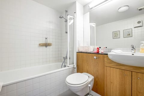 Combined shower/tub, hair dryer, towels, soap