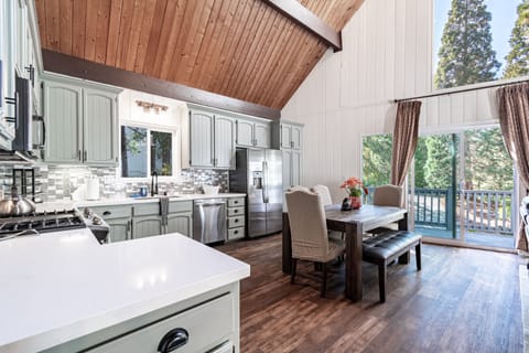 Large dining table with extensions that can sit up to 8 people