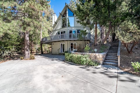 Huge flat driveway with plenty of parking or room to just play basketball