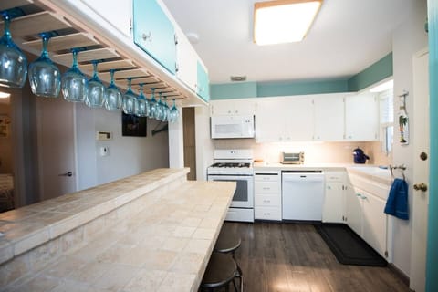 The refreshed kitchen includes a brand new range and microwave.