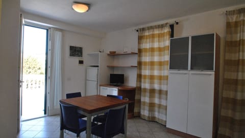 living room with kitchnette and sofa bed