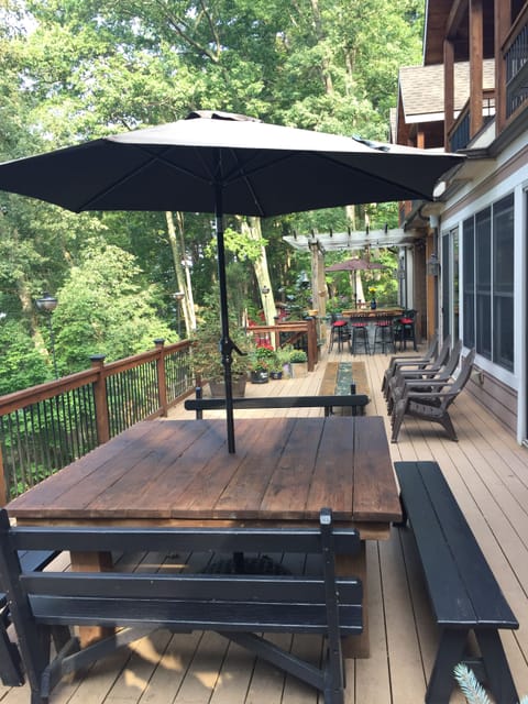 The deck is 90 feet long overlooking the lake, it has 5 different themed areas! 
