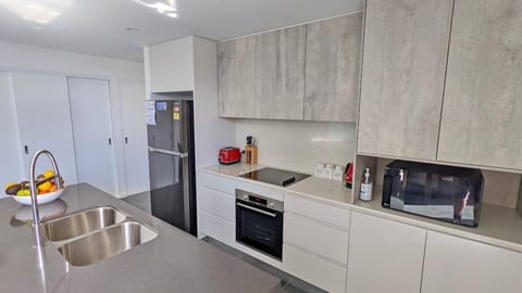 Fridge, microwave, dishwasher, dining tables