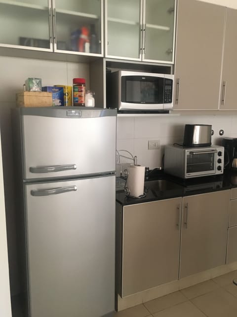 Microwave, coffee/tea maker, cookware/dishes/utensils