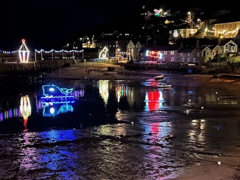 Mousehole; quaint Cornish fishing village with legendary Xmas lights
