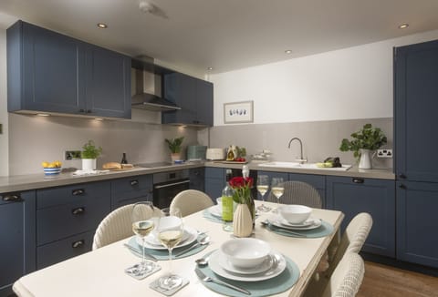 Cob Cottage, St Agnes. Ground floor: Kitchen with dining table seating six guests