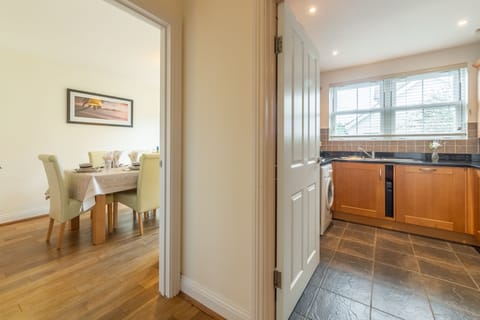 Porthia, Lelant. Ground floor: Dining room leading to kitchen