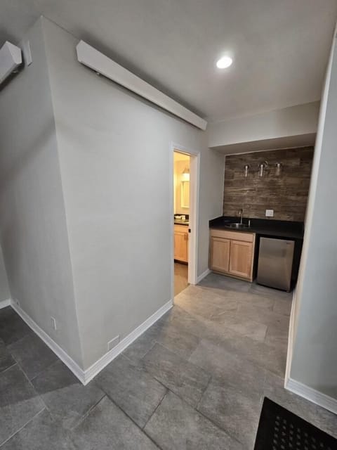 Lower level entry to fourth bedroom and living area